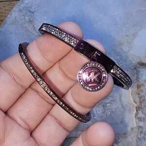 2 purple metallic MK bracelets